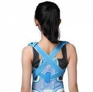 Korset yordamida bolaning holatini tuzatish